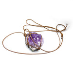 Rough amethyst cluster pendant in a brown cord net — VoxArcana