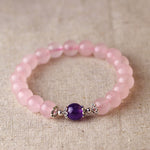 Pink crystal bead bracelet with a purple accent bead — VoxArcana