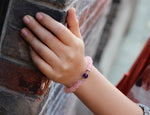Pink crystal bead bracelet with a purple accent bead — VoxArcana