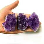 Amethyst cluster piece in the hand, sold by weight 10 to 20 g — VoxArcana