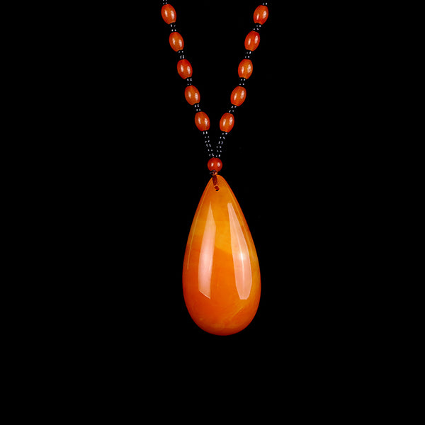 Orange teardrop pendant necklace, amber look, on a beaded chain — VoxArcana