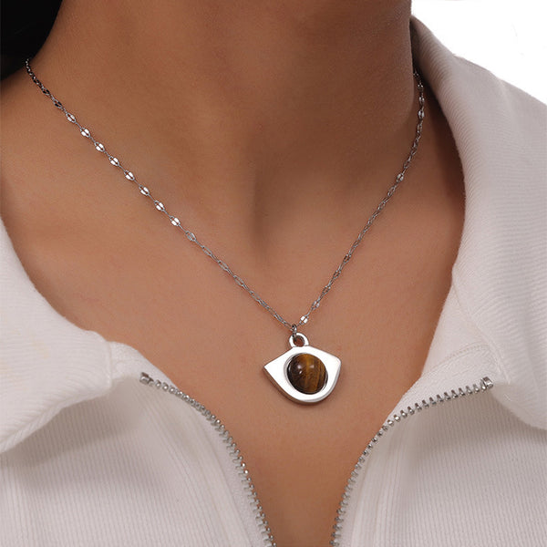 Eye-shaped pendant necklace with tiger's eye cabochon, silver tone — VoxArcana