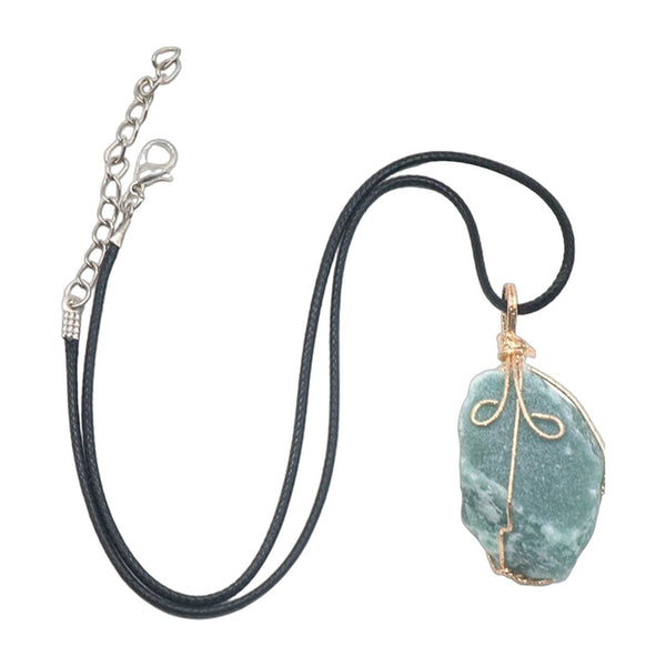 Raw green stone pendant wrapped in gold-tone wire, on black cord — VoxArcana