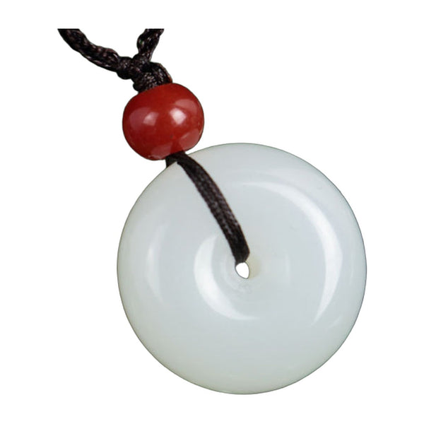 White jade-look donut pendant on a braided cord, 25 mm — VoxArcana